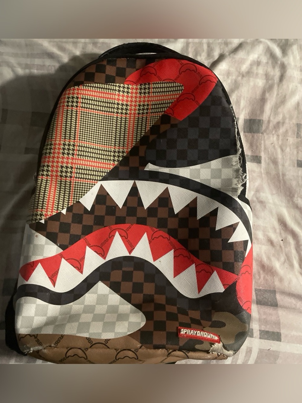 Sprayground 
buy it you get a free pen or v